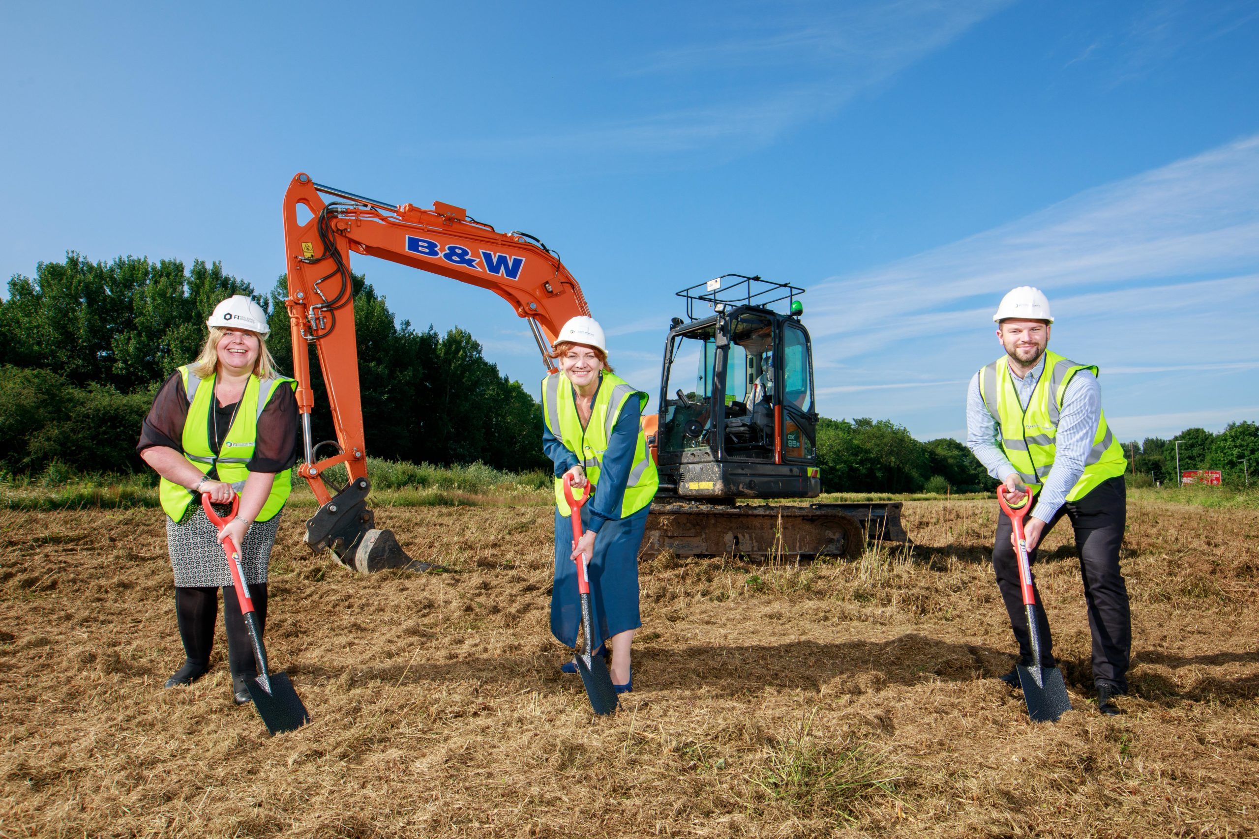 (L-R) Rebecca Morgan, Business Development Manager, Sarah Atherton MP, Matthew Pickles, Head of Industrial Property on site at Wrexham Industrial Estate Site 4